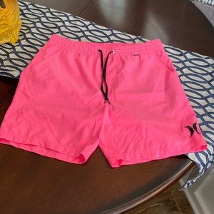 Bright pink Hurley hybrid shorts.  Mens drawstring in a size small.